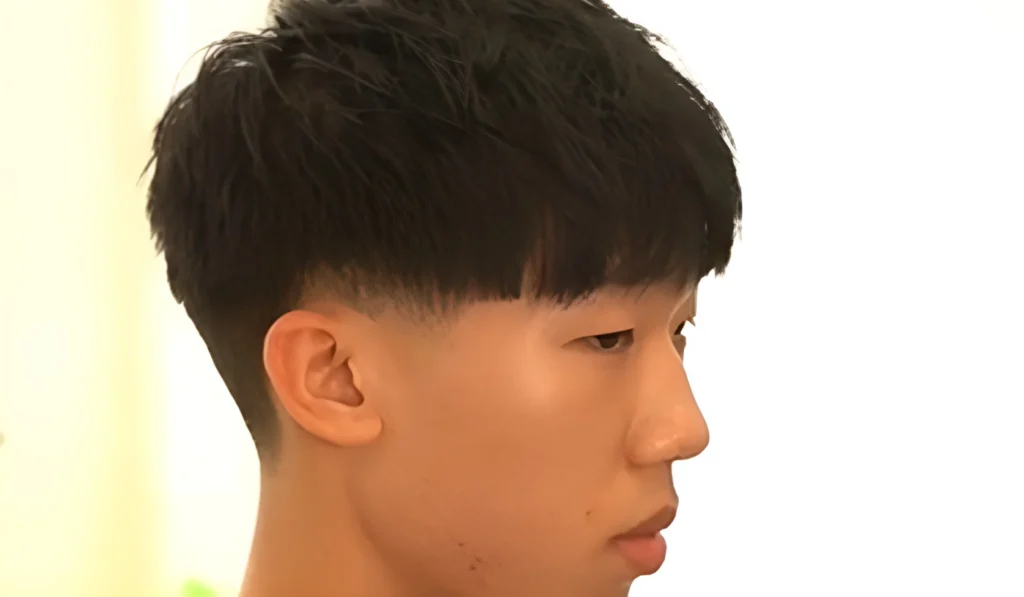 textured fringe with a low taper fade